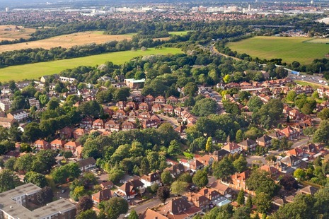 Aerial photograph of a residential part of the outskirts of London.