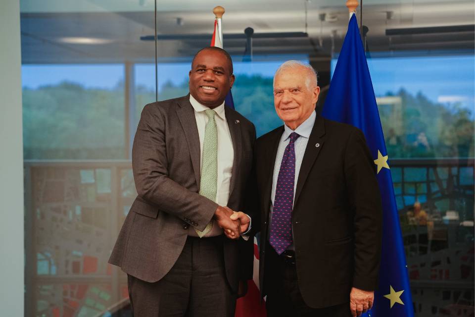 Foreign Secretary shaking hands with EU High Representative and Vice-President