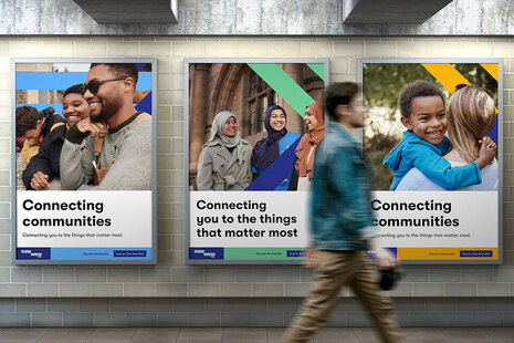 East West Rail posters at a railway station.