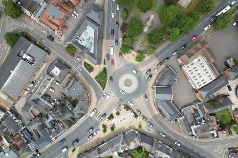 Road junction with cars on it