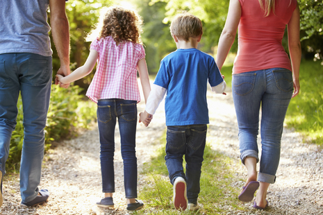 family walking together and holding hands