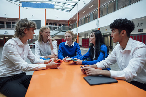 A group of secondary school students in uniform