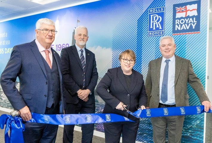 Minister for Defence Procurement and Industry, Maria Eagle MP cutting a ribbon, opening the new Glasgow Rolls-Royce nuclear submarine office.