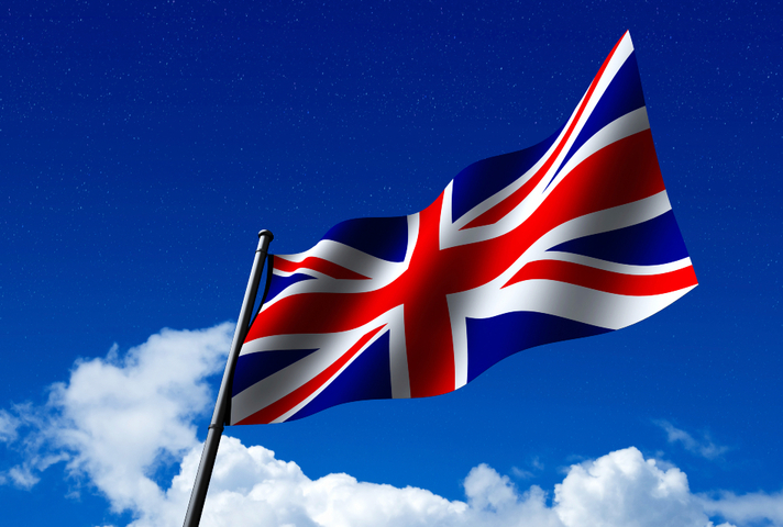 Union Jack flag against blue sky