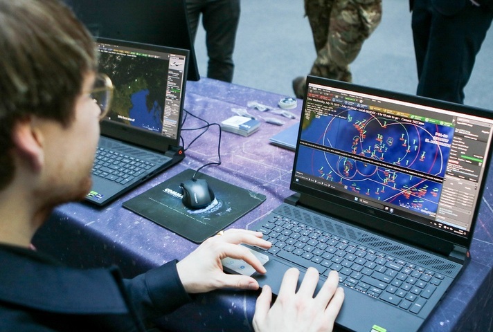 Person taking part in an esport on a  laptop 