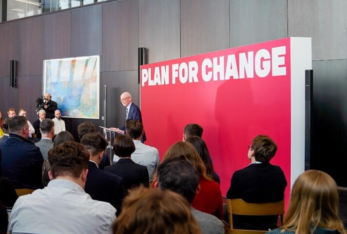 Pat McFadden speaking to an audience at the UCL East campus 