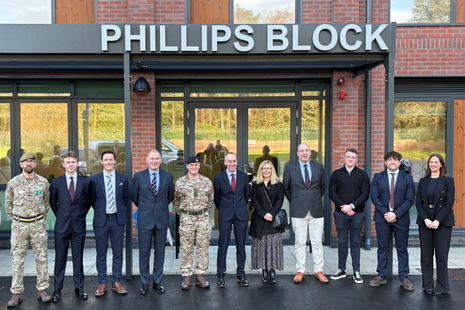 Family of the first Welsh Guardsman to be Academy Sergeant Major at RMAS Sandhurst, WO1 Horace Phillips, attend opening of the block named in his honour with representatives of DIO, the army, and contractor Reds10. MOD Crown Copyright.