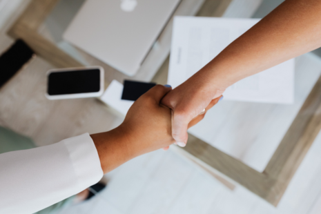 two people shaking hands