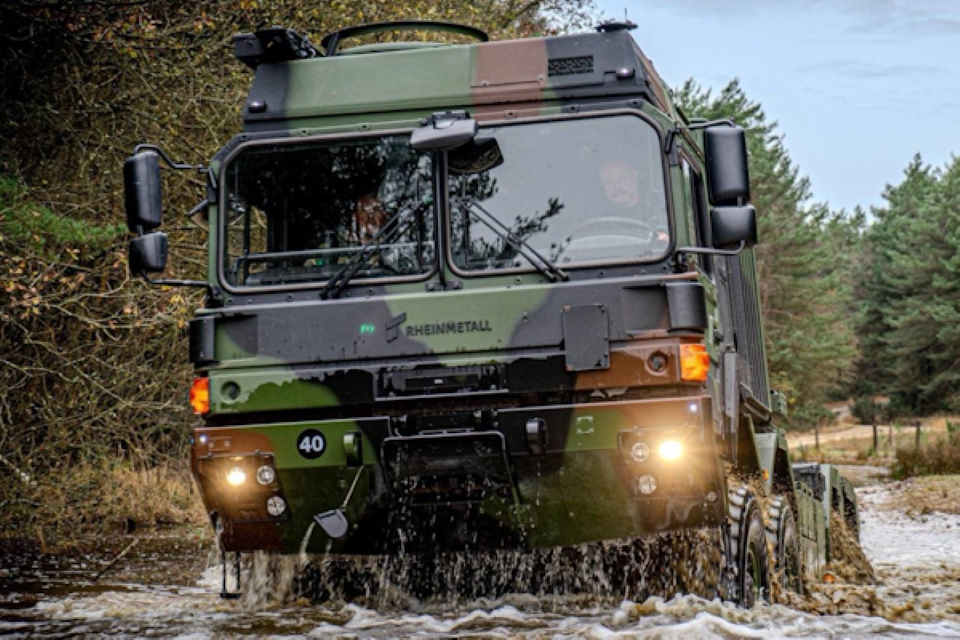 Troops receive early Christmas delivery of vital support trucks