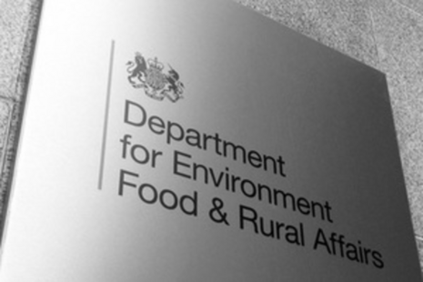 A silver, metallic sign that reads 'Department for Environment, Food & Rural Affairs'.