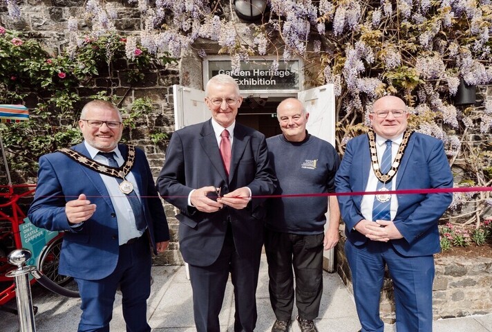 Secretary of State with the Mayor of Antrim and Newtownabbey, Councillor Neil Kelly, Deputy Mayor Councillor Paul Dunlop BEM, and World War II expert and tour guide Mike Gilmore.