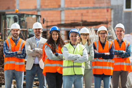 A group of people in high visability safety clothing.