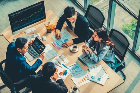 Businesspeople Analysing Data