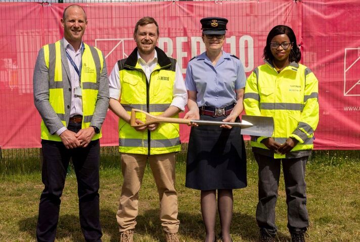 Representatives from RAF Cosford, DIO, Reds10 and Arcadis at the groundbreaking, wearing high vis and holding a ceremonial spade.