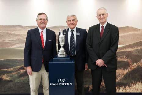 Caption: Secretary of State Hilary Benn with The Claret Jug trophy and (L-R) United States Ambassador to the UK Warren A. Stephens and Captain of The Royal and Ancient Golf Club of St Andrews, Ian Pattinson.