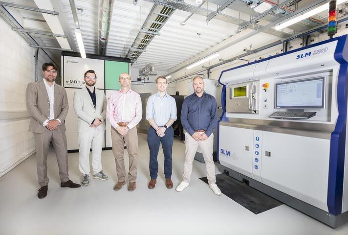 Freemelt (left) and Nikon SLM (right) teams at Central Support Facility launch event with UKAEA's Roy Marshall (centre)