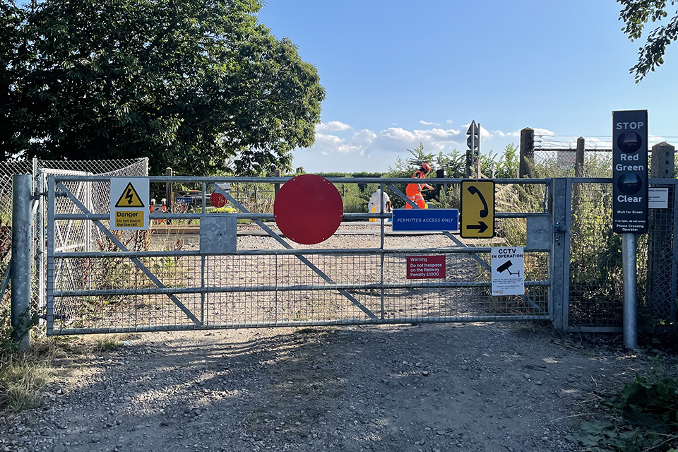 Collision between a train and a van at Bax user worked level crossing