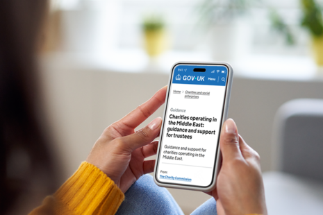 mobile phone with guidance image on screen