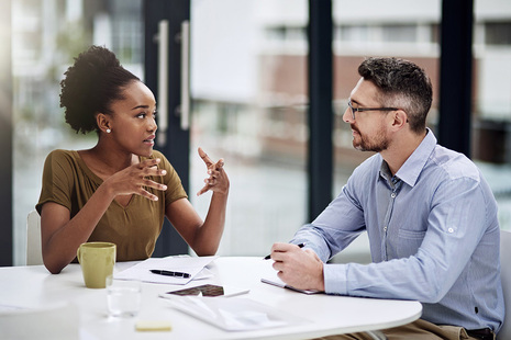 Two people having a meeting