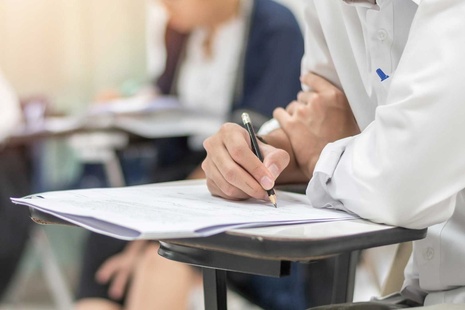 A student writing during an exam