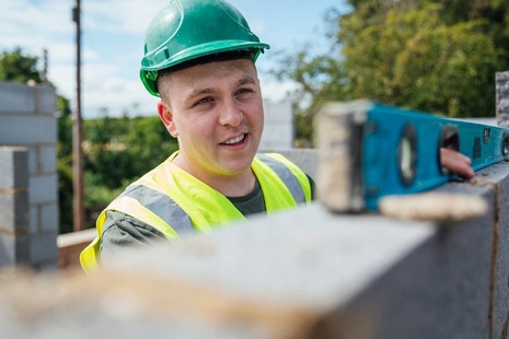 A vocational student on a building site