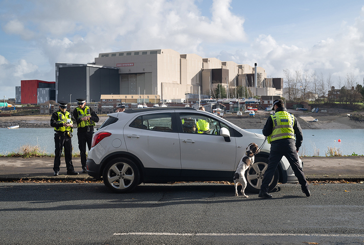 Project Servator officers examining a vehicle during the deployment.
