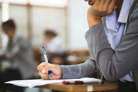 A student writing during an exam