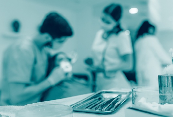 Dentists caring for patient