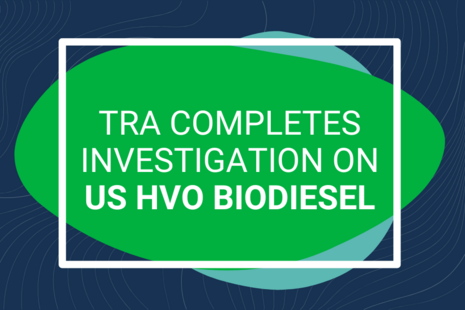 A navy blue background with overlapping circles in green and aqua with text stating: 'TRA completes investigation on HS HVO Biodiesel'. A white box outline is framing the text overlapping the circles. 