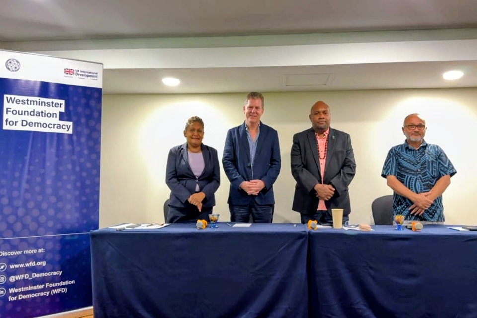 High Commissioner Paul Turner in a group photo at the forum