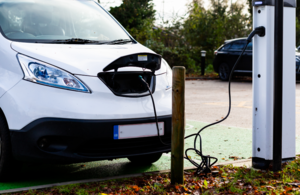 Commercial electric vehicle illustration linked to UK depot charging and fleet grant support