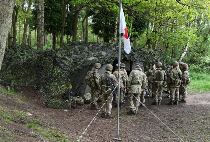 military medical personnel with tent