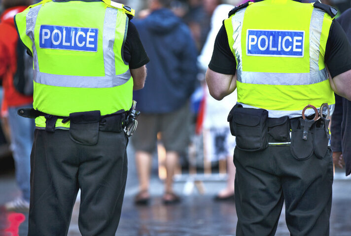 Two police officers standing