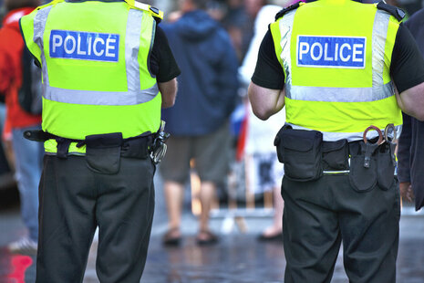 Two police officers standing