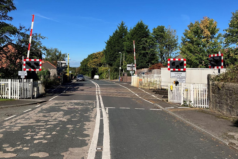 Collision between a train and a car at Hoghton level crossing