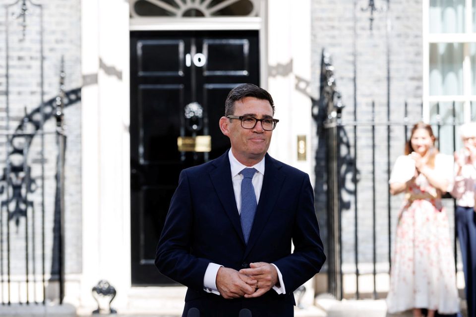 Prime Minister Andry Brunham outside No 10 Downing Street