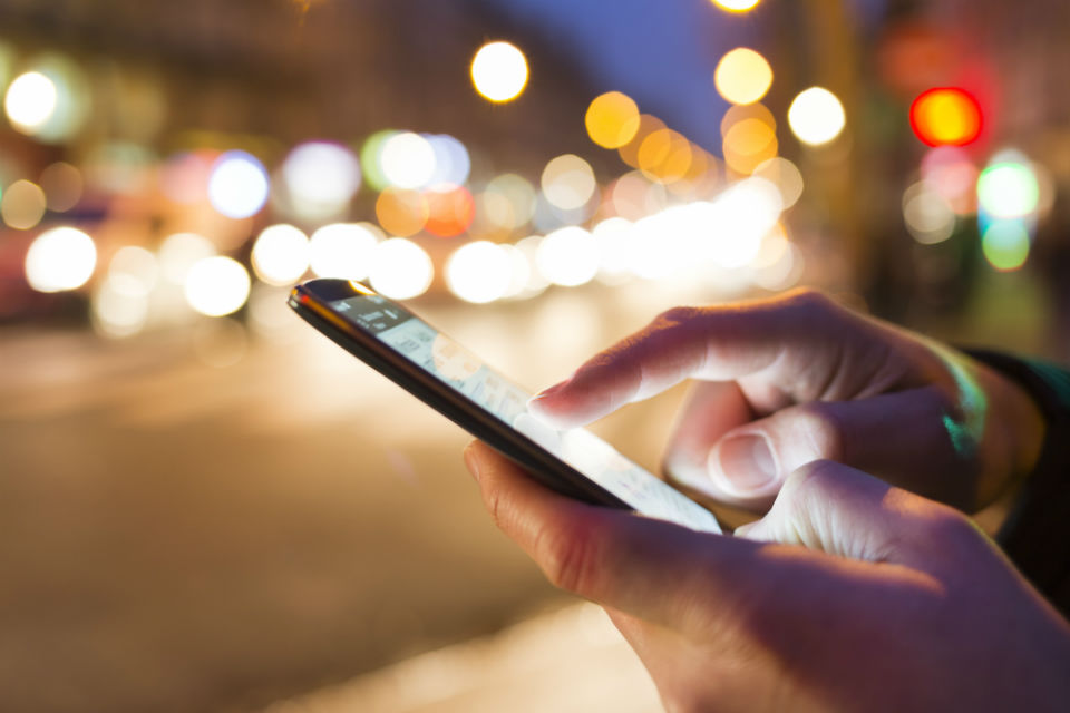 Mobile phone being used at night