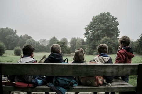 Children on a bench. Credit: Piron Guillaume, Unsplash