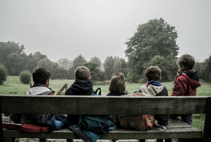 Children on a bench. Credit:  Piron Guillaume, Unsplash