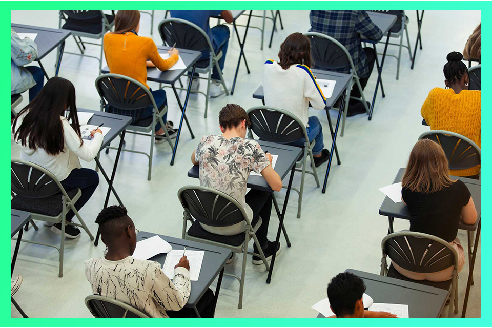 Overhead image of students taking an exam