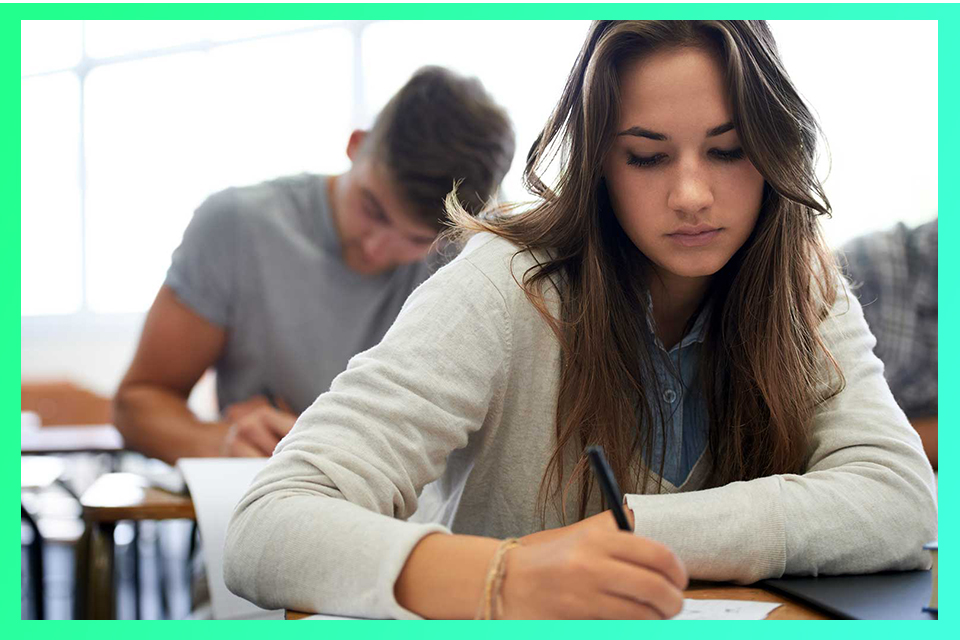Students writing in an exam