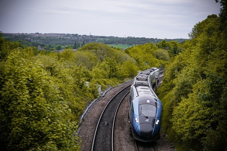 Blue Train in Countryside