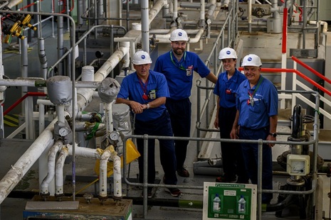 Inside the HALES facility with one of the shift teams who worked to empty the storage tank.