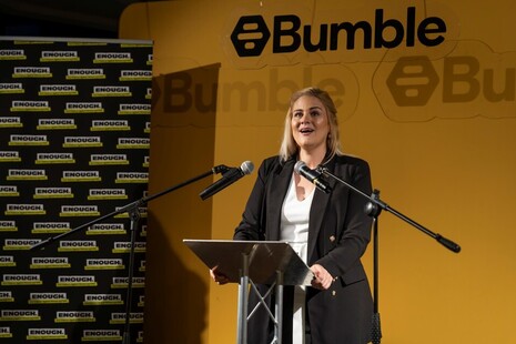 Minister Alex-Davies Jones speaking at a podium