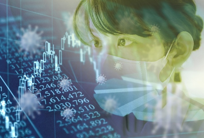 Woman with face mask alongside columns of numbers. Credit: iStockPhoto