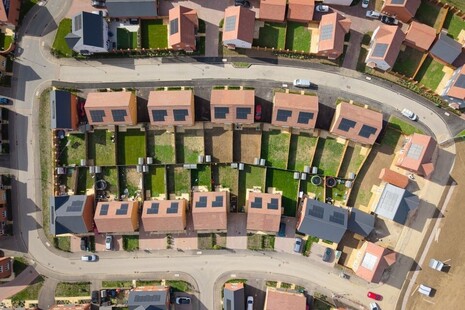 An aerial photograph of houses in the UK